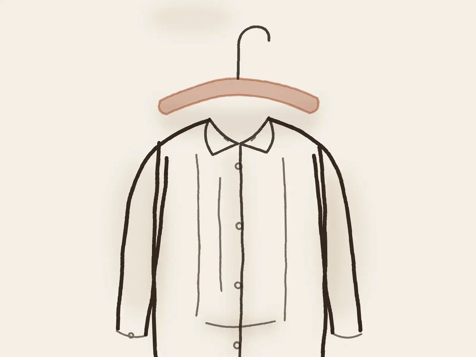 Chemise en lin suspendue sur un cintre en bois